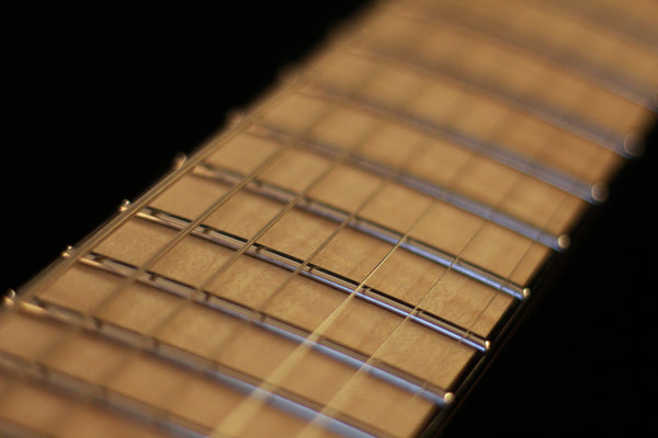 Skervesen: Custom Chiroptera 7 : Flame Maple Over Limba (Korina) Body Electric Guitar
