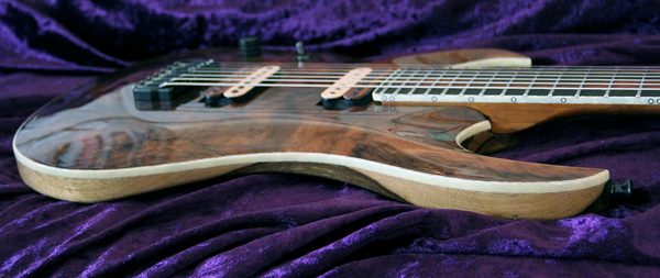 BlacKat Electric Guitar. DC 7 String Walnut Carved Top