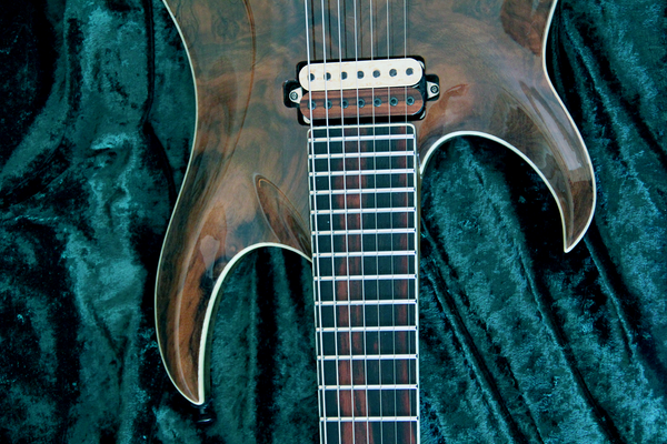 BlacKat Electric Guitar. DC 7 String Walnut Carved Top